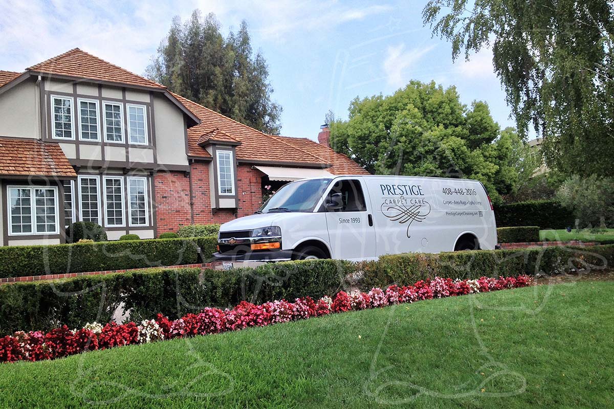 Carpet Cleaning Van Pulling Up at a Home Photo Example